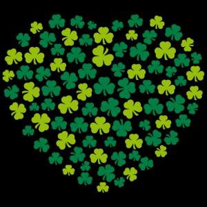 Heart design for Saint Patrick's day made of Irish three-leaf clovers.